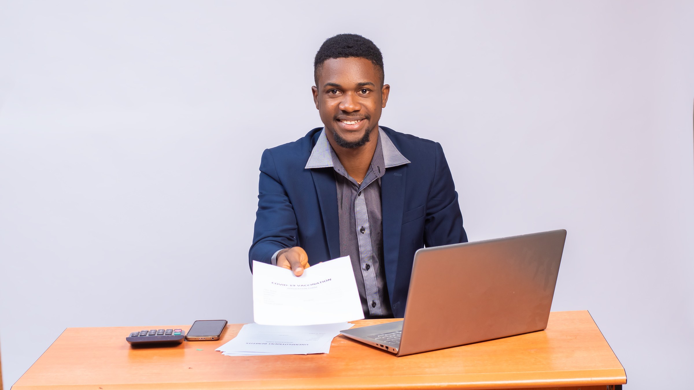 Operations manager working at a desk, first operations hire